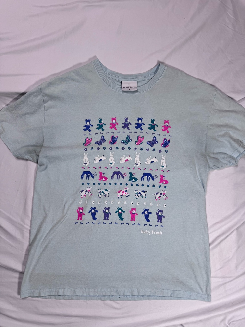 Teddy Fresh Pastel Blue Tee with Multicolor Animal Grid 90’s vibes 100% cotton